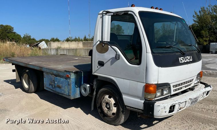 image for item DM0374 2002 Isuzu NPR  flatbed truck