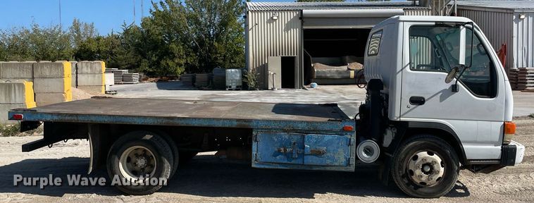 image for item DM0374 2002 Isuzu NPR  flatbed truck