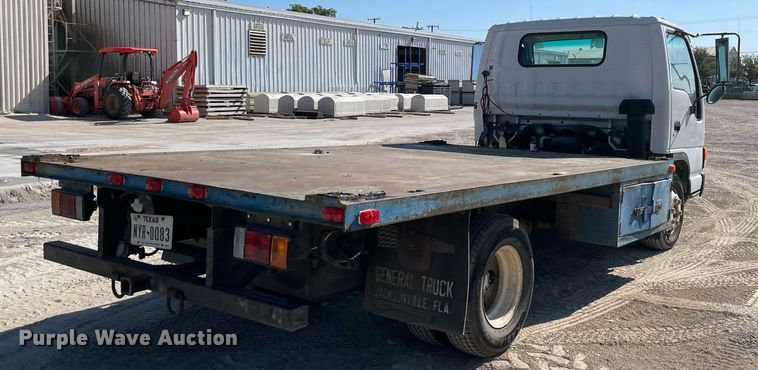 image for item DM0374 2002 Isuzu NPR  flatbed truck