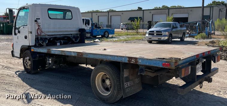 image for item DM0374 2002 Isuzu NPR  flatbed truck