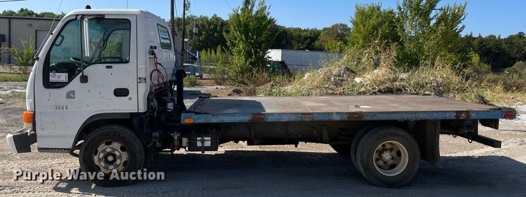 image for item DM0374 2002 Isuzu NPR  flatbed truck