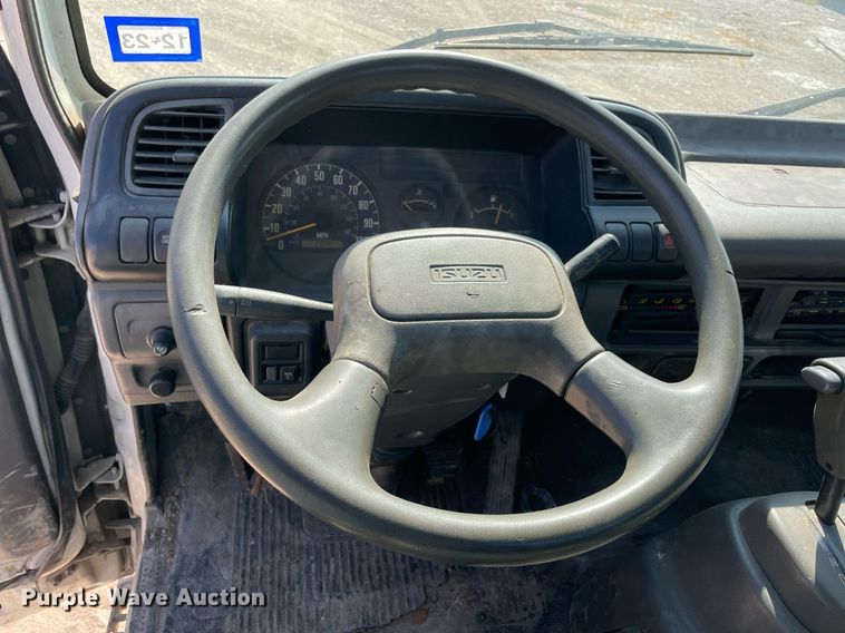 image for item DM0374 2002 Isuzu NPR  flatbed truck