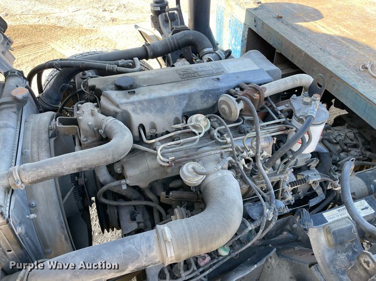 image for item DM0374 2002 Isuzu NPR  flatbed truck