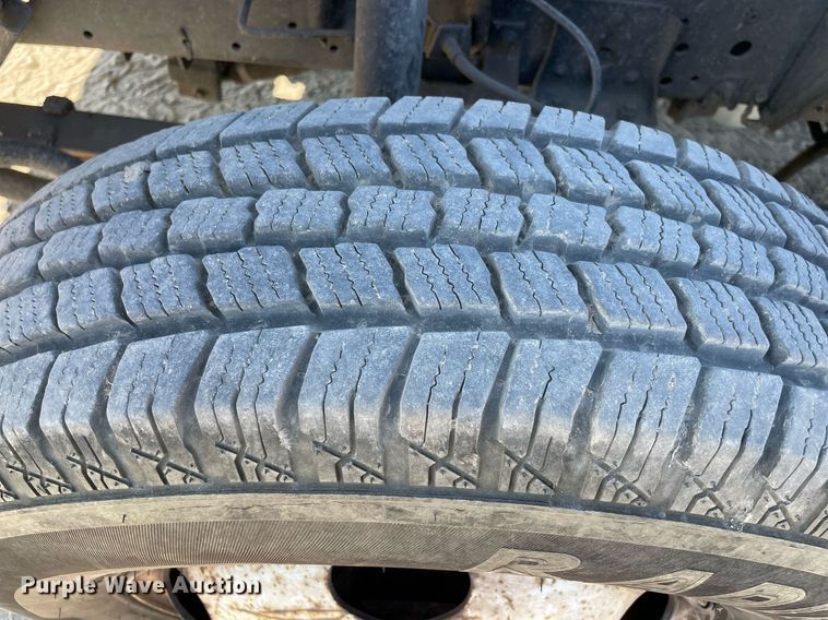 image for item DM0374 2002 Isuzu NPR  flatbed truck