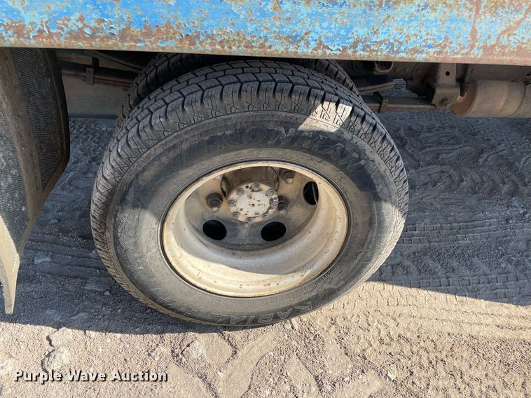 image for item DM0374 2002 Isuzu NPR  flatbed truck