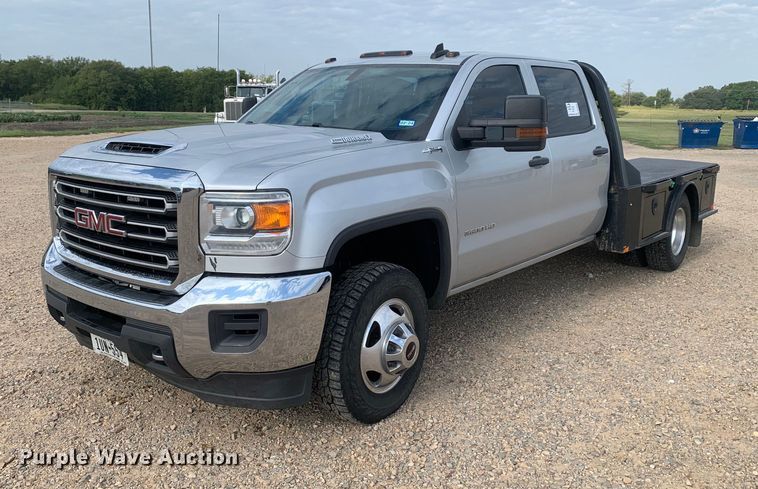 image for item DP8669 2018 GMC Sierra 3500HD  Crew Cab flatbed pickup truck