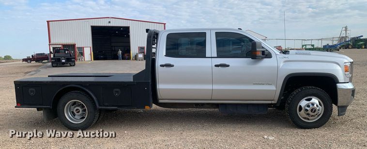 image for item DP8669 2018 GMC Sierra 3500HD  Crew Cab flatbed pickup truck