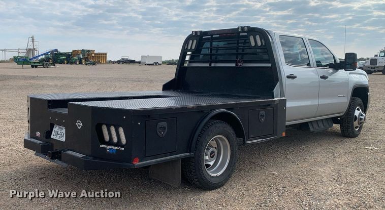 image for item DP8669 2018 GMC Sierra 3500HD  Crew Cab flatbed pickup truck