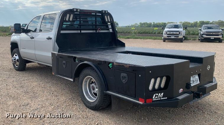 image for item DP8669 2018 GMC Sierra 3500HD  Crew Cab flatbed pickup truck