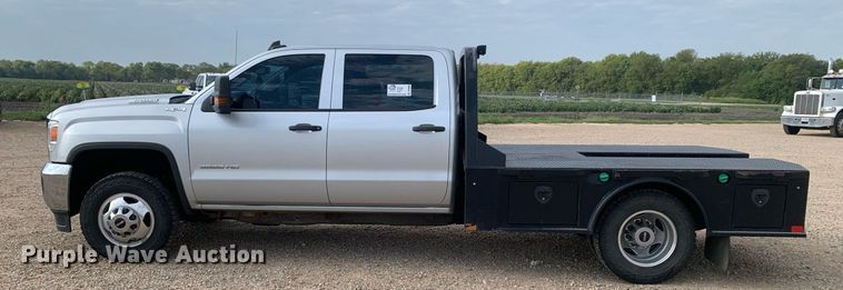 image for item DP8669 2018 GMC Sierra 3500HD  Crew Cab flatbed pickup truck