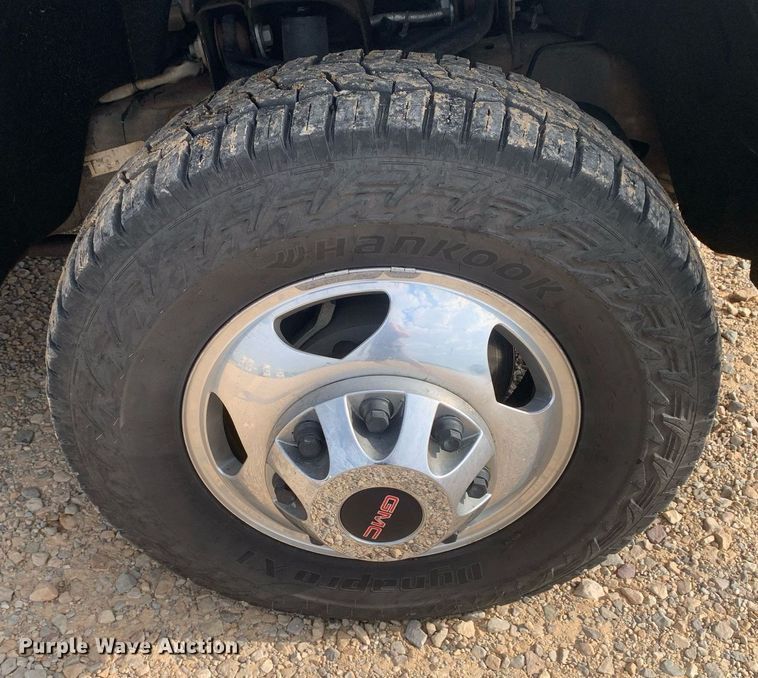 image for item DP8669 2018 GMC Sierra 3500HD  Crew Cab flatbed pickup truck