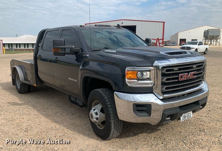 image for item DP8670 2018 GMC Sierra 3500HD  Crew Cab flatbed pickup truck