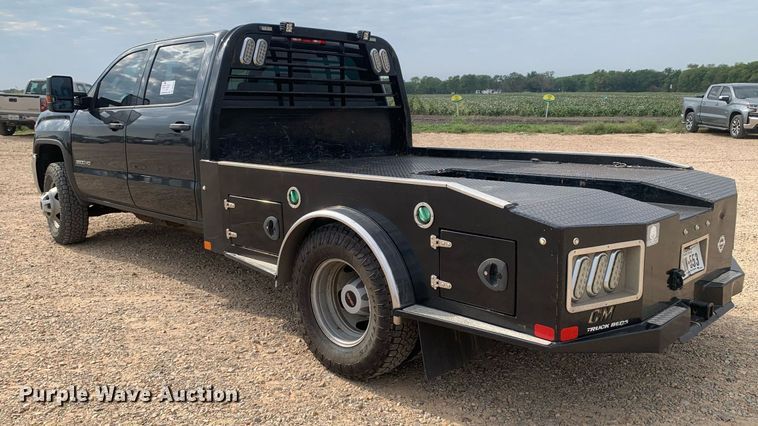 image for item DP8670 2018 GMC Sierra 3500HD  Crew Cab flatbed pickup truck