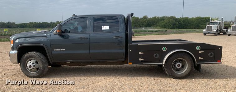image for item DP8670 2018 GMC Sierra 3500HD  Crew Cab flatbed pickup truck
