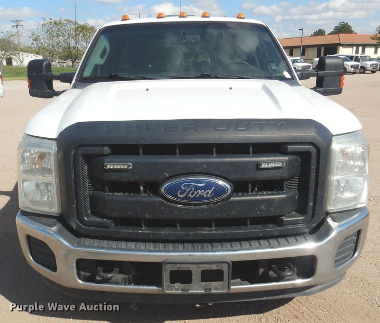 image for item KD9206 2016 Ford F350 Super Duty  SuperCab flatbed pickup truck