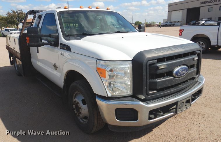 image for item KD9206 2016 Ford F350 Super Duty  SuperCab flatbed pickup truck