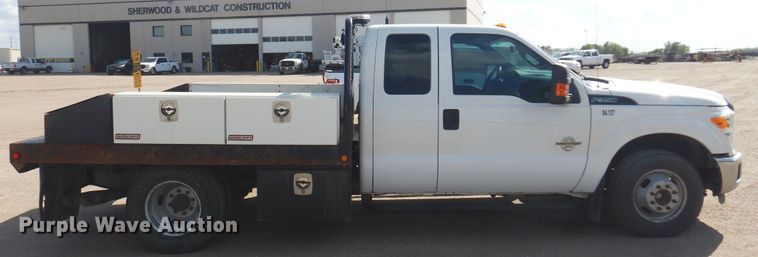 image for item KD9206 2016 Ford F350 Super Duty  SuperCab flatbed pickup truck