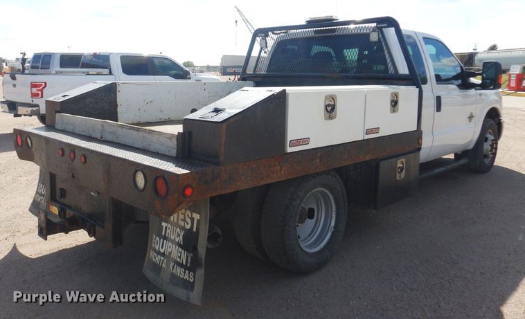 image for item KD9206 2016 Ford F350 Super Duty  SuperCab flatbed pickup truck