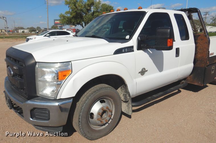 image for item KD9206 2016 Ford F350 Super Duty  SuperCab flatbed pickup truck