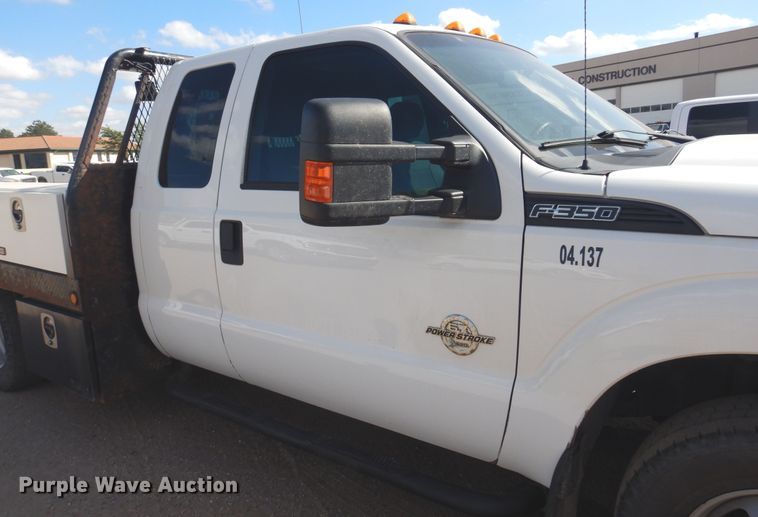 image for item KD9206 2016 Ford F350 Super Duty  SuperCab flatbed pickup truck