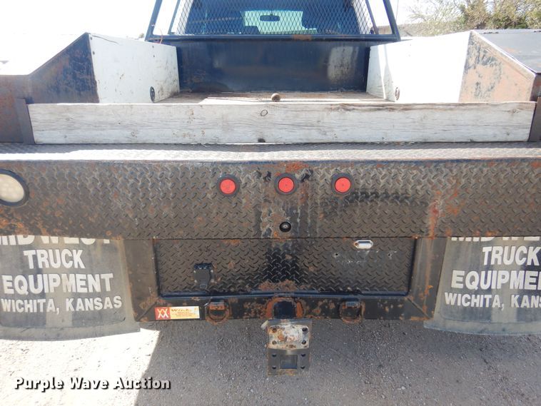 image for item KD9206 2016 Ford F350 Super Duty  SuperCab flatbed pickup truck