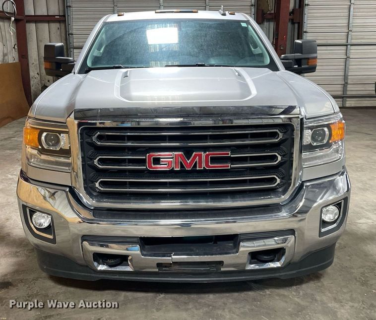 image for item MI9740 2016 GMC Sierra 3500HD  Crew Cab bale bed pickup truck