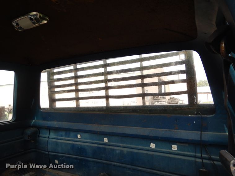 image for item MQ9468 1984 Ford F250  SuperCab flatbed pickup truck