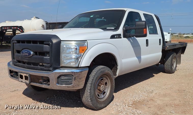 image for item MX9431 2014 Ford F250 Super Duty  Crew Cab flatbed pickup truck