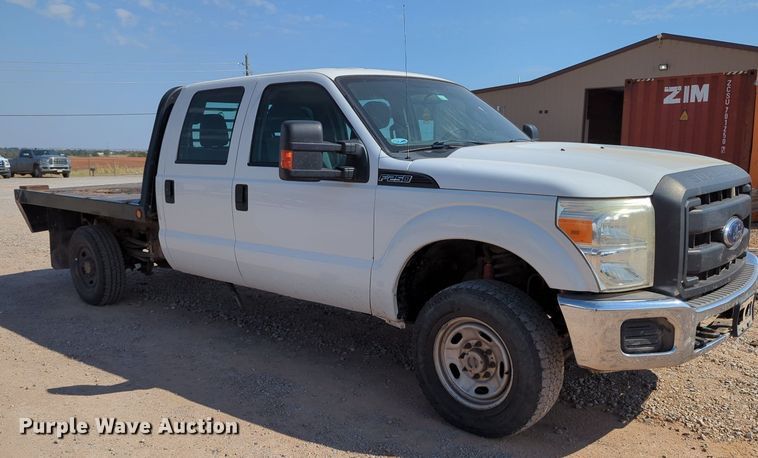 image for item MX9431 2014 Ford F250 Super Duty  Crew Cab flatbed pickup truck