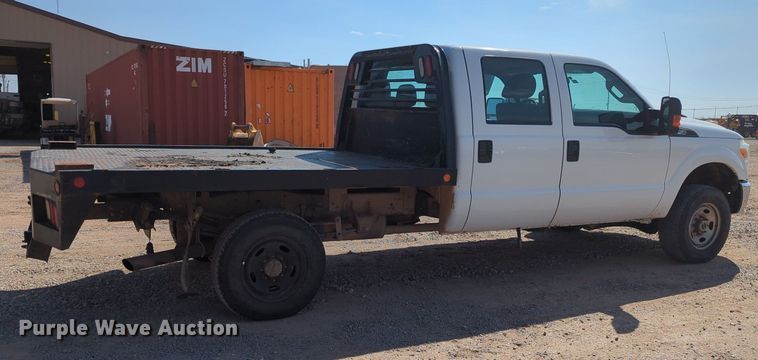 image for item MX9431 2014 Ford F250 Super Duty  Crew Cab flatbed pickup truck
