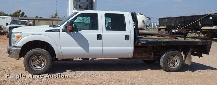 image for item MX9431 2014 Ford F250 Super Duty  Crew Cab flatbed pickup truck