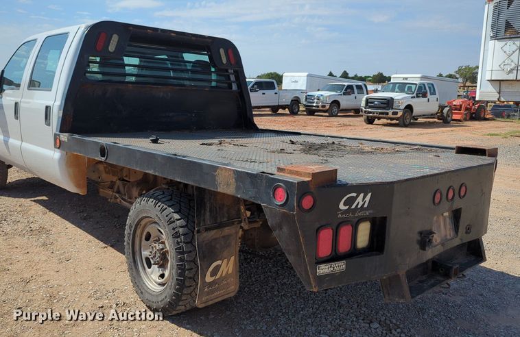 image for item MX9431 2014 Ford F250 Super Duty  Crew Cab flatbed pickup truck