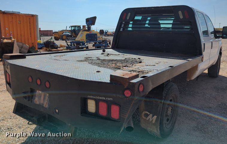 image for item MX9431 2014 Ford F250 Super Duty  Crew Cab flatbed pickup truck