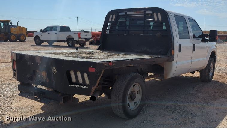 image for item MX9433 2015 Ford F250 Super Duty  Crew Cab flatbed pickup truck