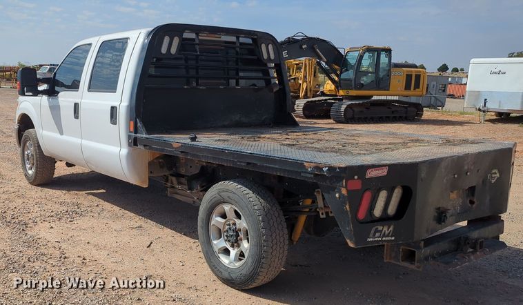 image for item MX9433 2015 Ford F250 Super Duty  Crew Cab flatbed pickup truck