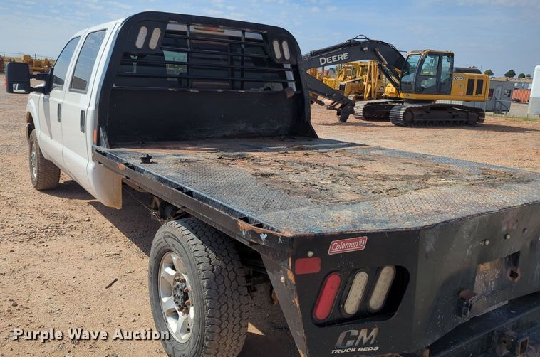 image for item MX9433 2015 Ford F250 Super Duty  Crew Cab flatbed pickup truck