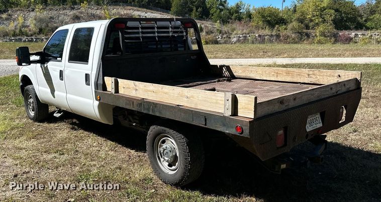 image for item NP9690 2013 Ford F250 Super Duty XL  Crew Cab flatbed pickup truck