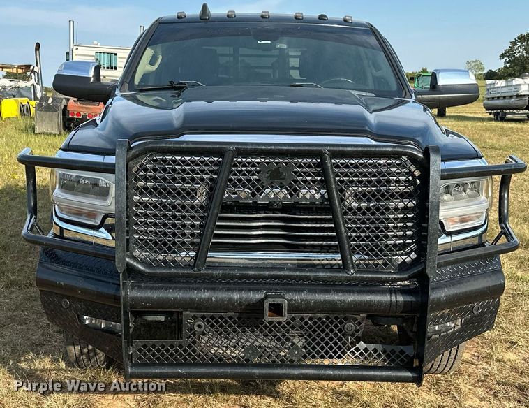 image for item NQ9365 2019 Dodge  Ram 3500 Laramie Crew Cab flatbed pickup truck