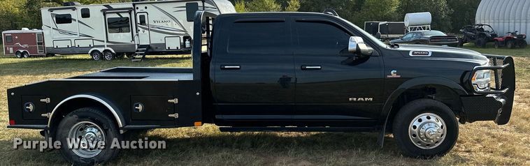 image for item NQ9365 2019 Dodge  Ram 3500 Laramie Crew Cab flatbed pickup truck