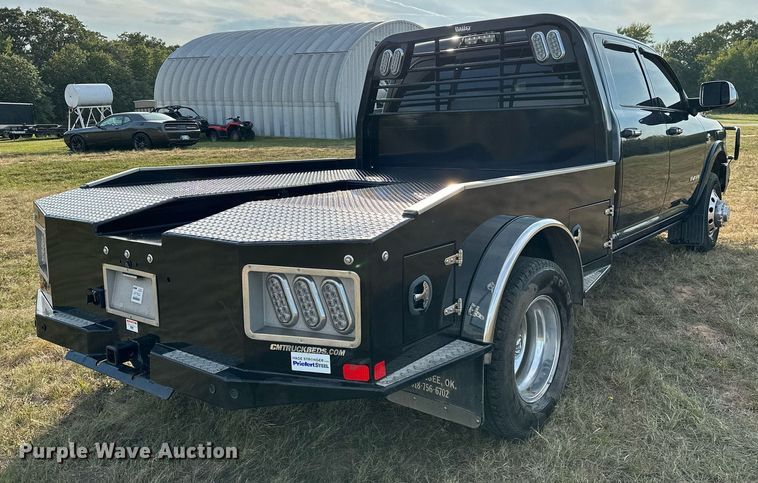 image for item NQ9365 2019 Dodge  Ram 3500 Laramie Crew Cab flatbed pickup truck