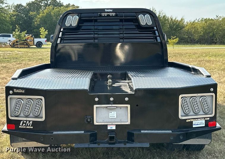 image for item NQ9365 2019 Dodge  Ram 3500 Laramie Crew Cab flatbed pickup truck