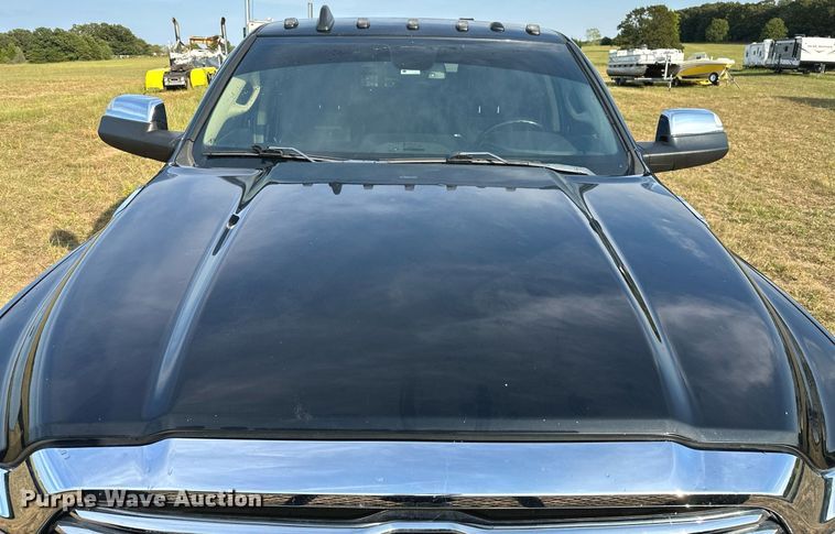 image for item NQ9365 2019 Dodge  Ram 3500 Laramie Crew Cab flatbed pickup truck