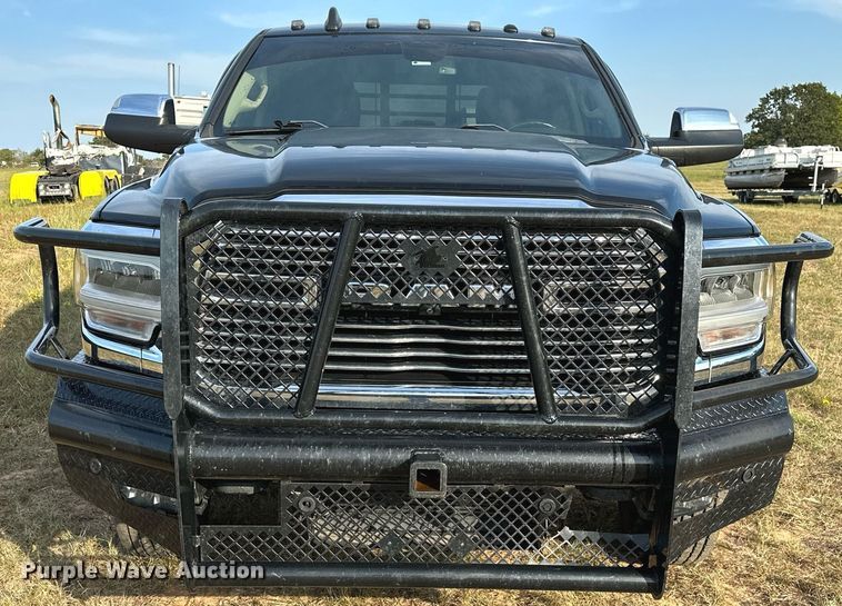 image for item NQ9365 2019 Dodge  Ram 3500 Laramie Crew Cab flatbed pickup truck