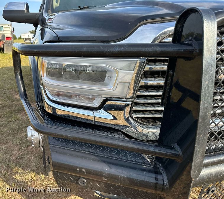 image for item NQ9365 2019 Dodge  Ram 3500 Laramie Crew Cab flatbed pickup truck