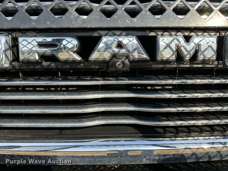 image for item NQ9365 2019 Dodge  Ram 3500 Laramie Crew Cab flatbed pickup truck