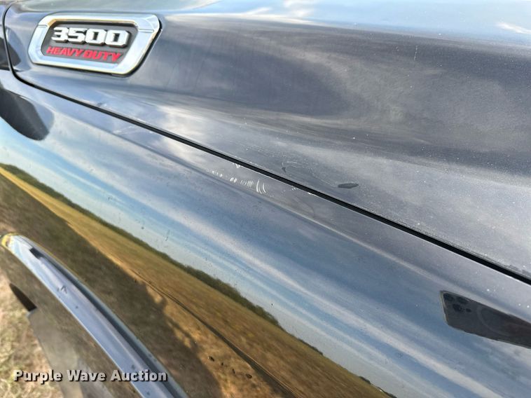 image for item NQ9365 2019 Dodge  Ram 3500 Laramie Crew Cab flatbed pickup truck