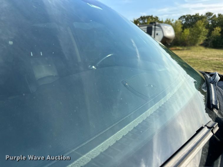 image for item NQ9365 2019 Dodge  Ram 3500 Laramie Crew Cab flatbed pickup truck