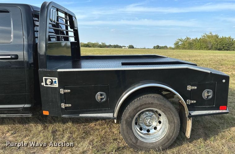 image for item NQ9365 2019 Dodge  Ram 3500 Laramie Crew Cab flatbed pickup truck