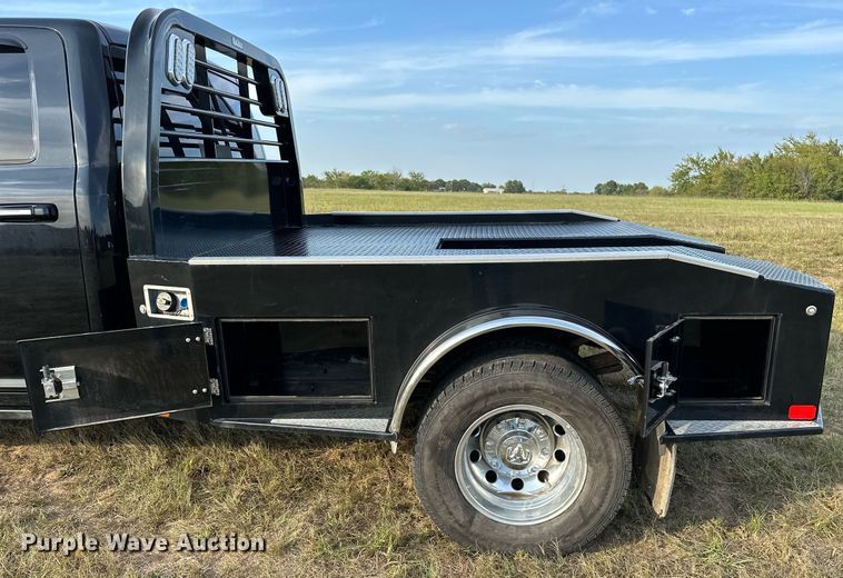 image for item NQ9365 2019 Dodge  Ram 3500 Laramie Crew Cab flatbed pickup truck