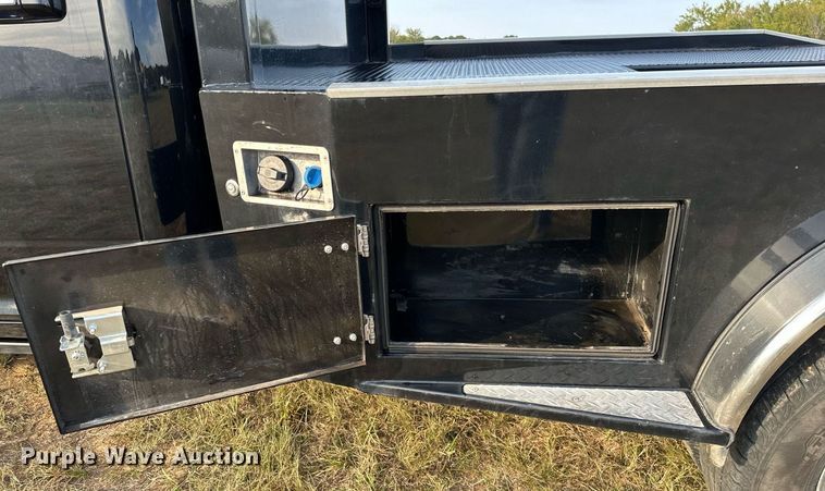 image for item NQ9365 2019 Dodge  Ram 3500 Laramie Crew Cab flatbed pickup truck